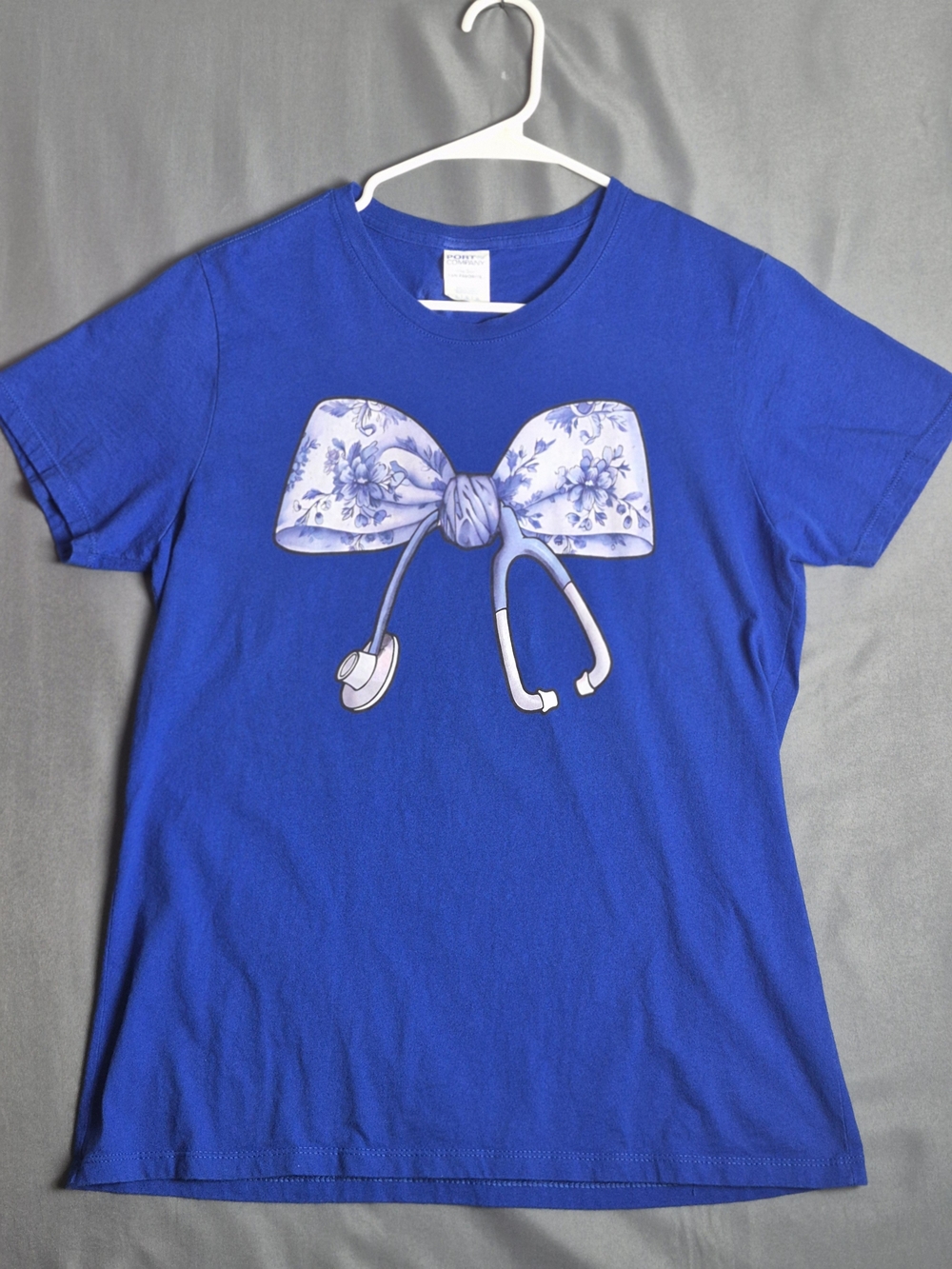 Nurse Blue Graphic Bow Stethoscope Tee. Size Lg
